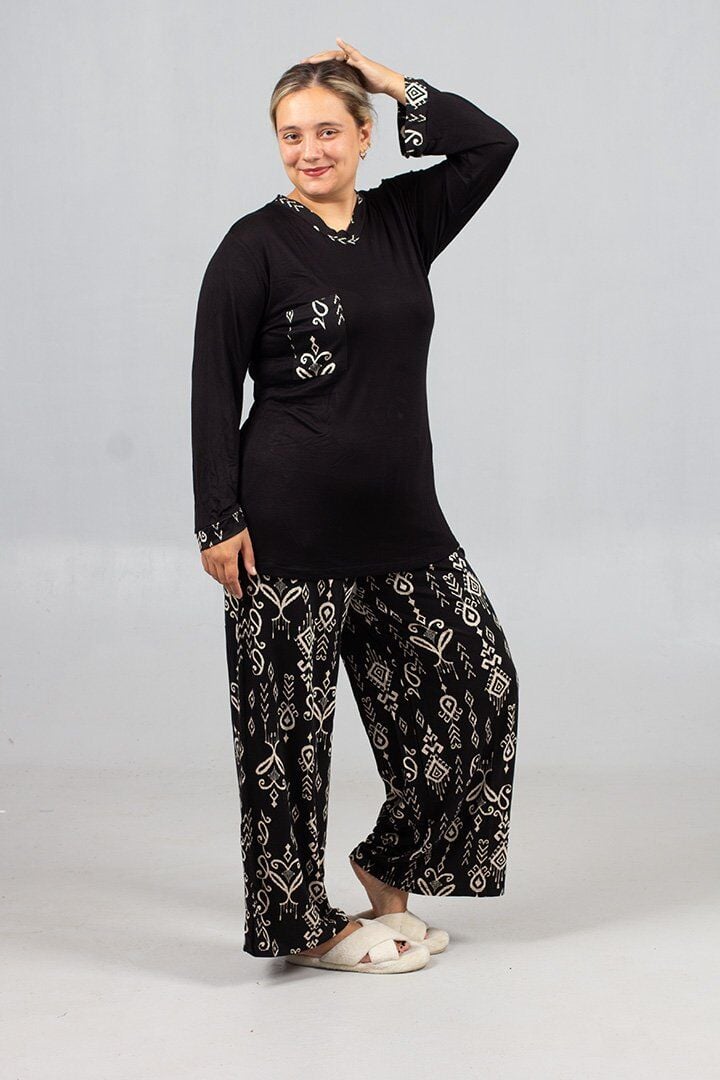 Büyük Beden Evde Şıklığın ve Konforun Dansı: Bol Paça Pijama Takımı!