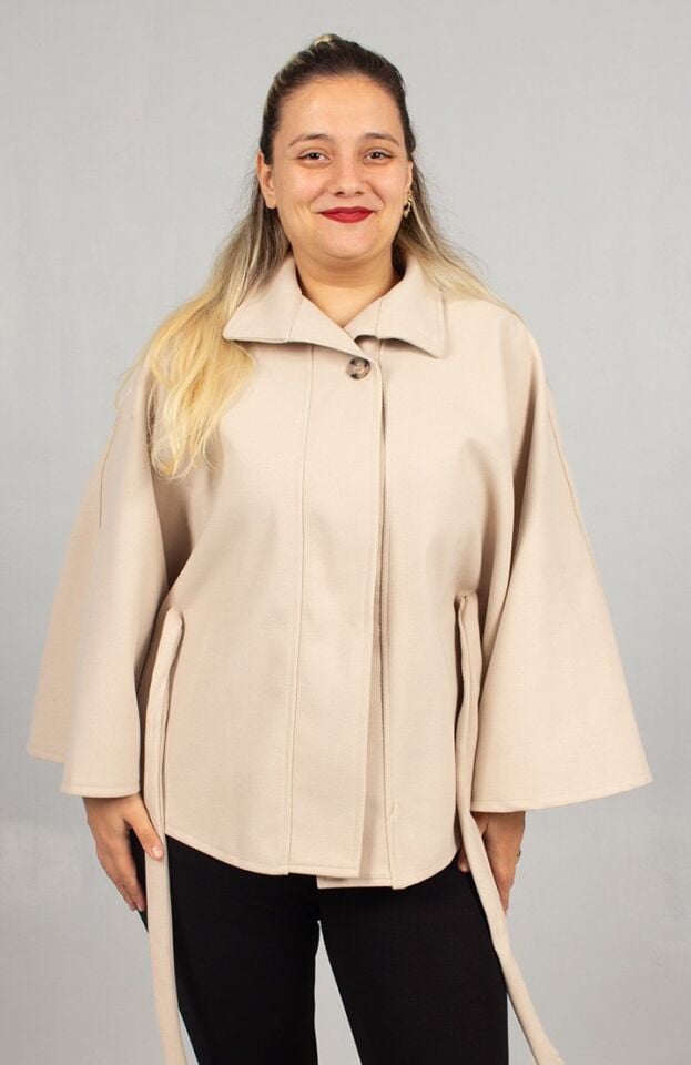 Kışın Aydınlığı: Krem Rengi Büyük Beden Kaşe Pelerin